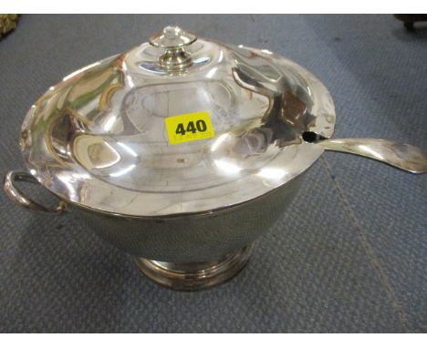 A silver plated soup tureen with lid and ladle 