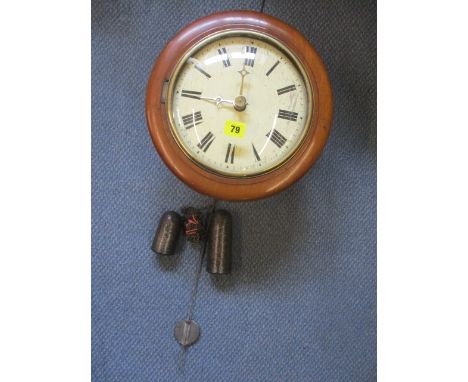A Victorian wall clock in a circular mahogany case, with label for Fehrenbach, with weights and pendulum 