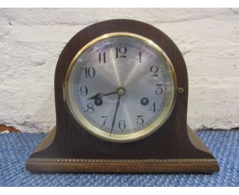 An early 20th century oak cased mantle clock 