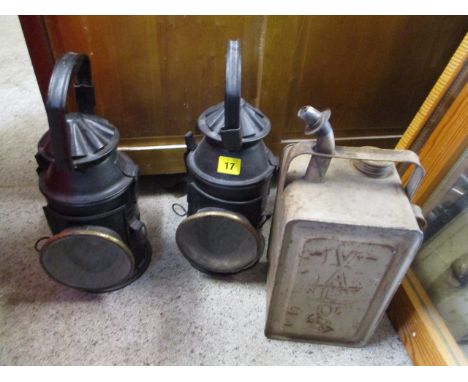 A pair of Railway signal lamps with green and red slides, together with a vintage petrol tank 