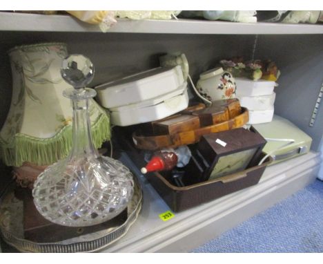 A mixed lot to include a ship's decanter, a Smith's clock and other items 