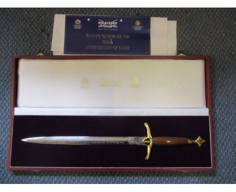 A cased commemorative Wilkinson Sword to commemorate The Allied Landing on The Coast of France on D-Day, with original receip