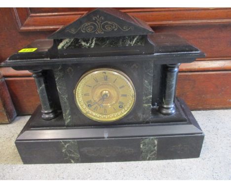A Victorian slate mantle clock 