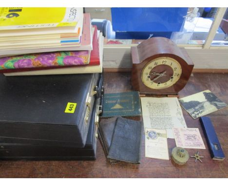 A mixed lot to include a walnut cased mantel clock with Westminster chimes, a stamp album, briefcases, leather wallets, an Am