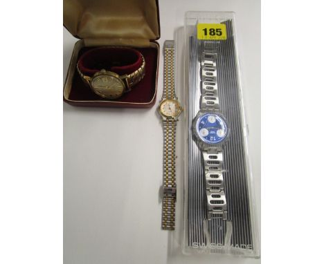 A boxed The Angus 25 Jewel automatic gents wrist watch, a boxed Swatch watch with a blue dial and three subsidiary dials and 