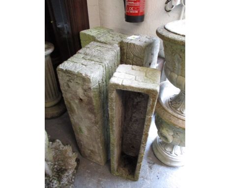A set of six reconstituted stone trough planters