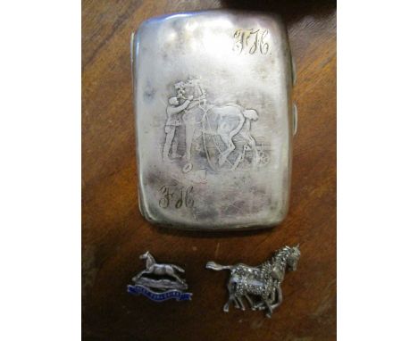 An Edwardian silver cigarette case, the front with a repousse design of a rider and horse, engraved initials to the top and b