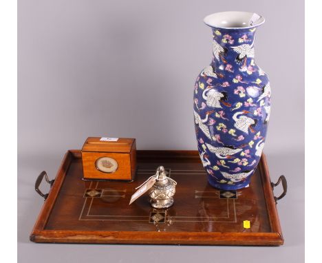 A glazed two-handled tray with inlaid Arts & Crafts design, a satinwood cigarette dispenser, a Ronson Gloria table lighter an