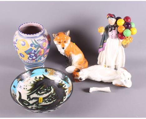 A Royal Worcester porcelain model, fox, 7 1/2" high, a companion hound (leg for restoration), a Royal Doulton "Biddy Penny Fa