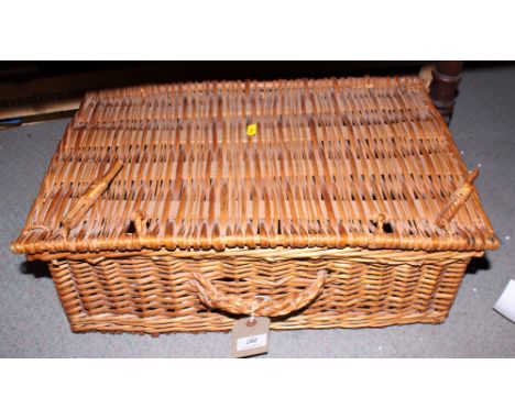 A wicker picnic hamper 