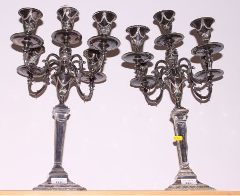 A pair of Adam style silver plated five-light candlelabra 