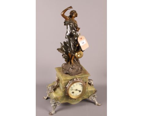 A 19th Century French mantel clock with bronzed figure of lady surmount, on green onyx base, 22" high 