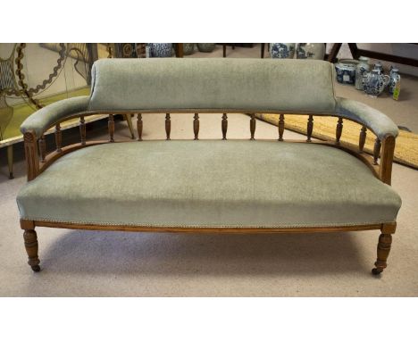 SOFA, 70cm H x 140cm W, late Victorian walnut in green velour on ceramic castors. 