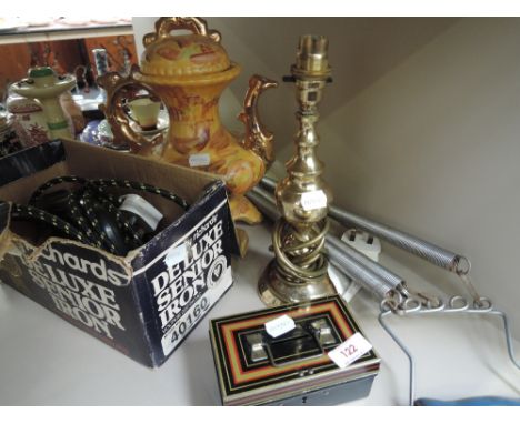 A miscellaneous lot including a brass effect table lamp, vintage Morphy Richards iron, chest expander and cash box etc