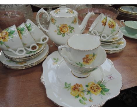 A Royal Stafford part tea service with yellow rose design