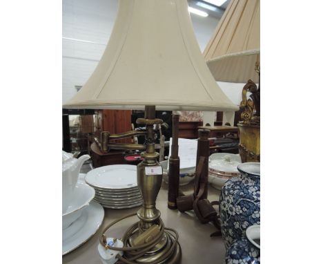 A brass effect side column table lamp and shade