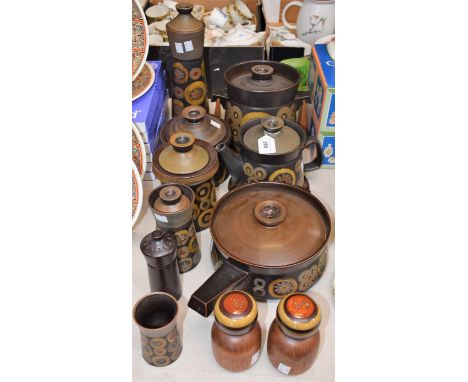 An unusual Denby Pottery Arabesque pattern large casserole dish on treen stand; a pair of Arabesque Stone and Teak salt and p