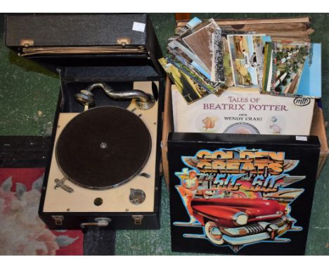 A Decca 50 portable record player; records including Mozart and other classical 