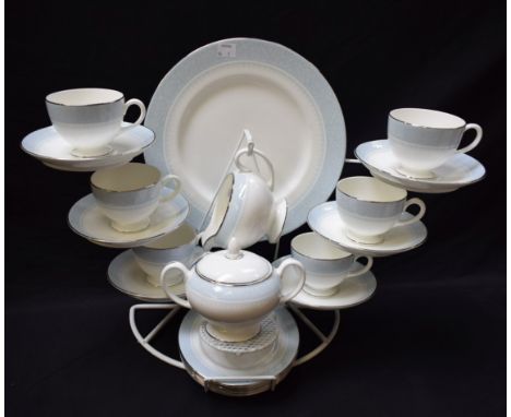 A Wedgwood Mayfair tea service for six, comprising cups, saucers, side plates, bread and butter plate, milk jug and sugar bow