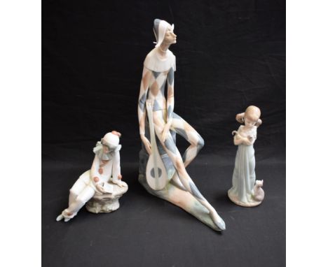 A Nao figure, Harlequin with Lute, 36cm; another, smaller Piernot; another, Kitten girl (3)