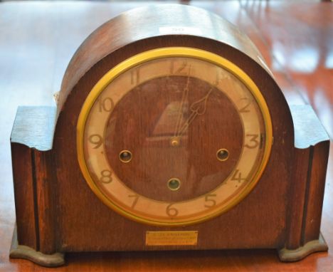 A mid-20th century oak cased mantel clock, Smiths movement, inscribed plaque to commemorate 21 years at The Glacier Metal Co.