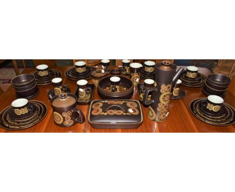 An extensive Denby Arabesque pattern six setting dinner and tea service, including dinner, side, dessert plates, casserole di