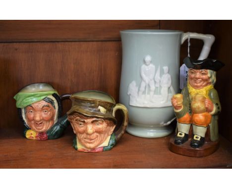 A Royal Doulton Toby jug, Happy John; two Royal Doulton character jugs, similar; a Spode Fortuna golfing mug, 17.5cm high (4)