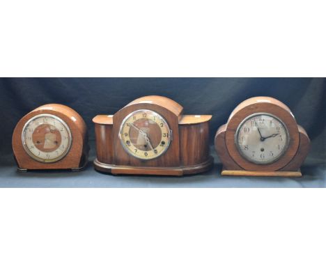 A mid 20th century Smiths Enfield mantel clock, oak case; two others, similar