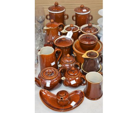 A Bourne Denby teapot, glazed throughout in traditional brown; other similar water jugs; coffee pots, filter pots, and casser