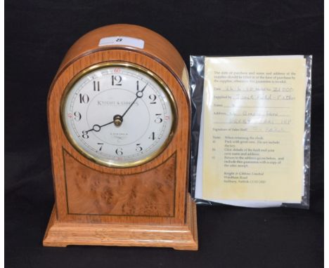 A Knight and Gibbins, London, mantel clock, golden oak and burr wood, eight-day movement, original receipt for £440