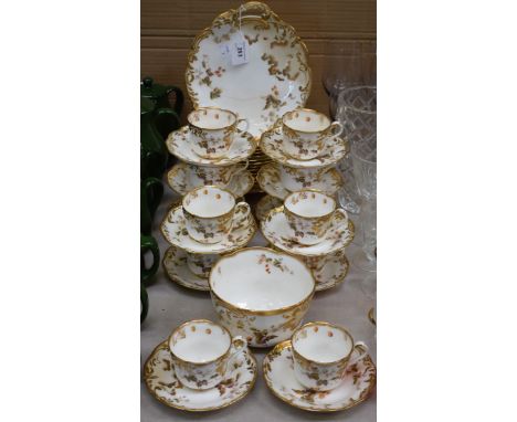 A late Victorian Crescent China part tea service, for twelve, including cups, saucers, cake plates; etc all transfer printed 