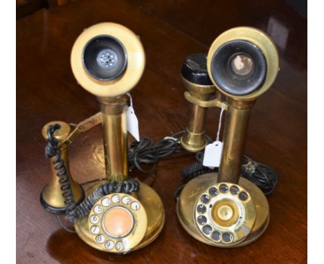 A pair of Edwardian style brass candlestick telephones