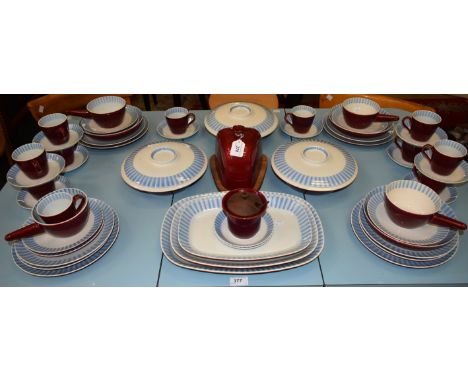 An Aluminia, Denmark, Jeannette dinner and tea service, comprising dinner plates, side plates, cups, saucers, soup bowls, che
