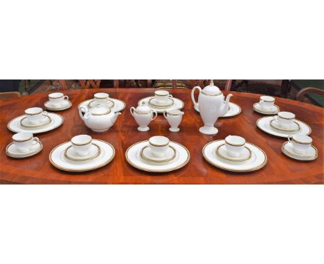 An extensive Wedgwood Clio pattern tea set, for ten, including teapot, coffee pot, sugar bowl, milk/cream jug, cups, saucers;