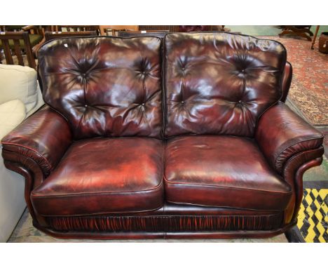 A 20th century oxblood leather sofa, 171cm wide
