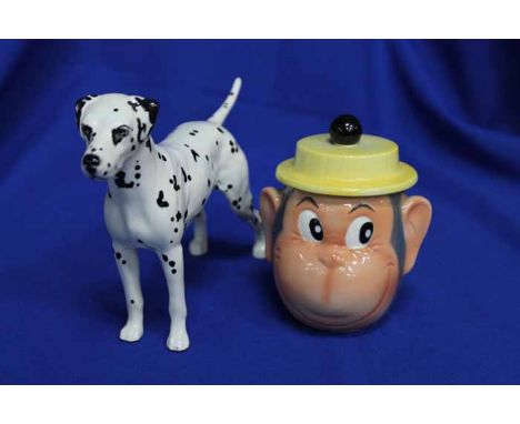 HAND-PAINTED BESWICK DOG
14.5 cm high; together with a Goebel Monkey lidded jar, 12.5 cm high