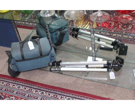 VINTAGE CAMERA AND TRIPOD
a Praktica B100 camera in a canvas bag with some accessories and a metal folding tripod