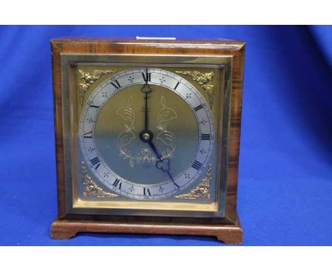 MANTEL CLOCK
by Elliott, cotained in a walnut case