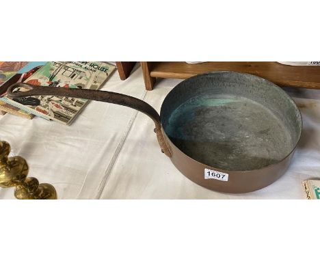 A heavy vintage copper pan with long handleThe only mark on this is No:26