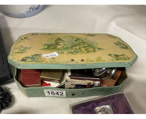 A vintage tin of old match boxes &amp; a lighter