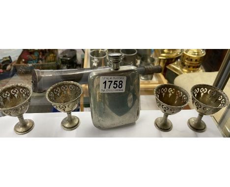 A hip flask &amp; 4 decorative pierced white metal mini goblets