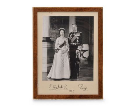 Elizabeth II (Queen of Great Britain) and Philip, Duke of Edinburgh, a full length portrait of the couple in full ceremonial 