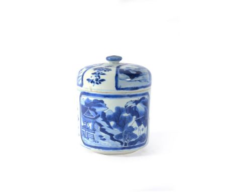 A Chinese blue and white jar and cover, Kangxi, painted with landscape panels including a figure in a pagoda and flowers, 15c