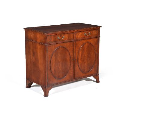 A pair of mahogany side cabinets in George III style, 20th century, each with two frieze drawers above cupboard doors enclosi
