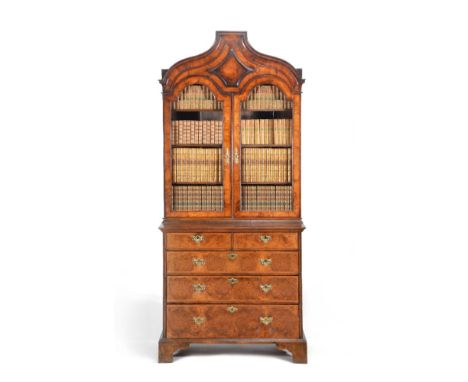 A walnut and featherbanded cabinet on chest, first half 18th century and later, the cabinet and chest sections associated to 