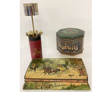 A vintage Huntley &amp; Palmers biscuit tin depicting a horse and carriage scene. Together with a Betty Butter biscuit tin an