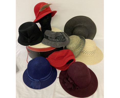 A modern large hat box together with a collection of vintage and modern felt and straw hats. To include Peter Bettley. 