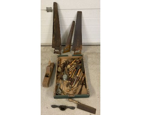 A box of vintage tools to include saws; a Hearnshaw Bros smoothing plane, bradawls and brushes. Lot also include spoke shave 