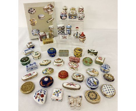 A collection of 45 del Prado fine porcelain lidded trinket boxes to include oriental designs. Together with a binder containi