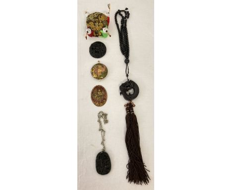 A small collection of oriental items to include carved jade pendants, prayer beads &amp; a trinket box.  